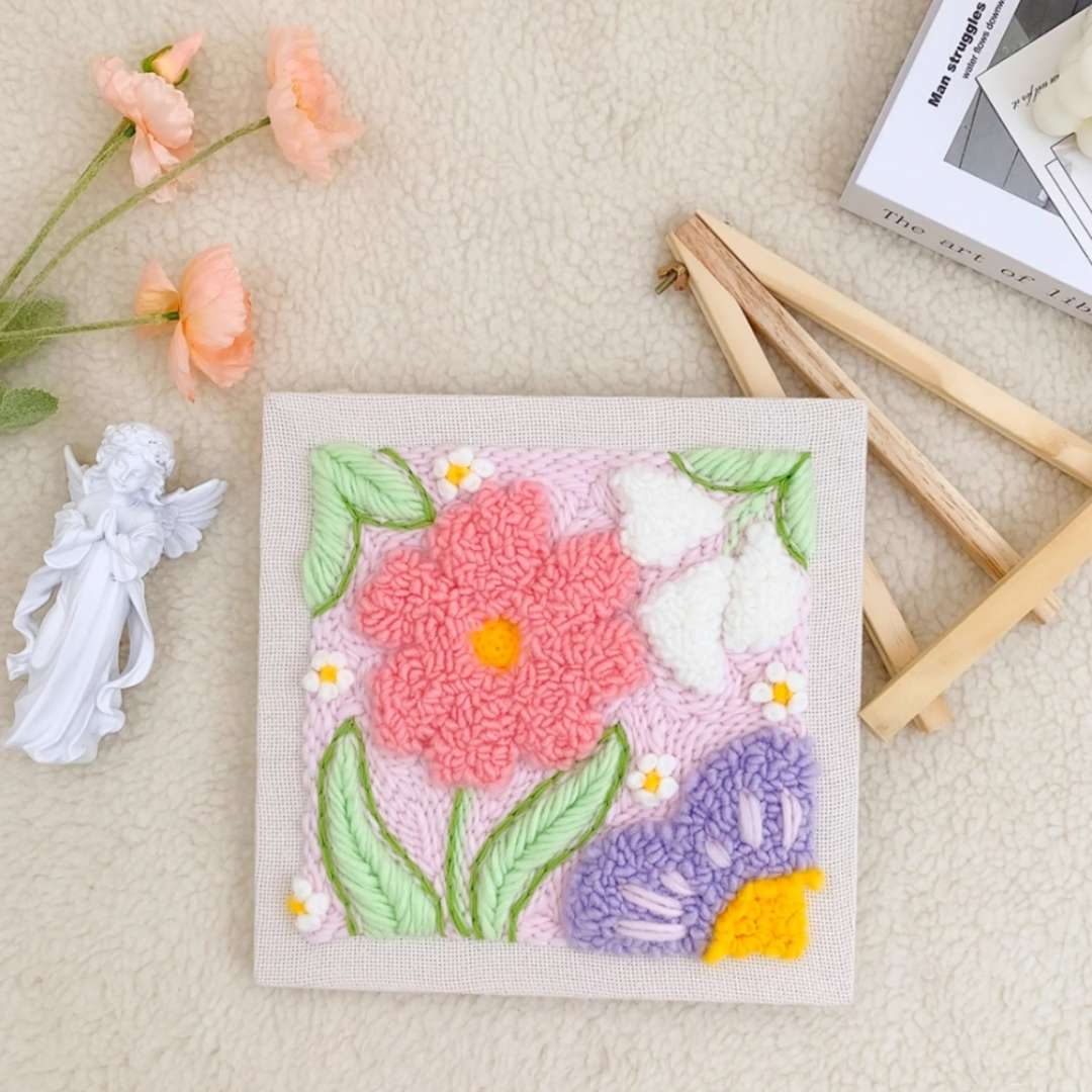 Closeup of the Puddingcase Flower-Pink Punch Needle Kit, with pastel floral embroidery pattern for DIY enthusiasts