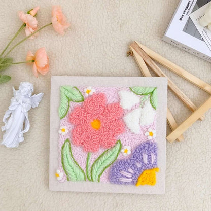 Closeup of the Puddingcase Flower-Pink Punch Needle Kit, with pastel floral embroidery pattern for DIY enthusiasts
