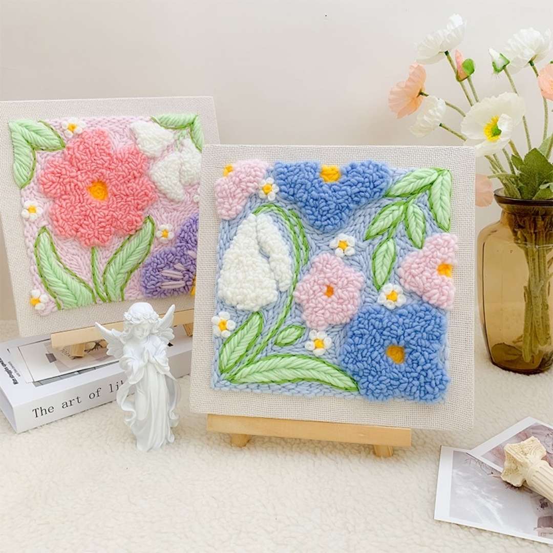 Puddingcase punch needle kit showcasing multiple floral designs, perfect for DIY embroidery and home decor