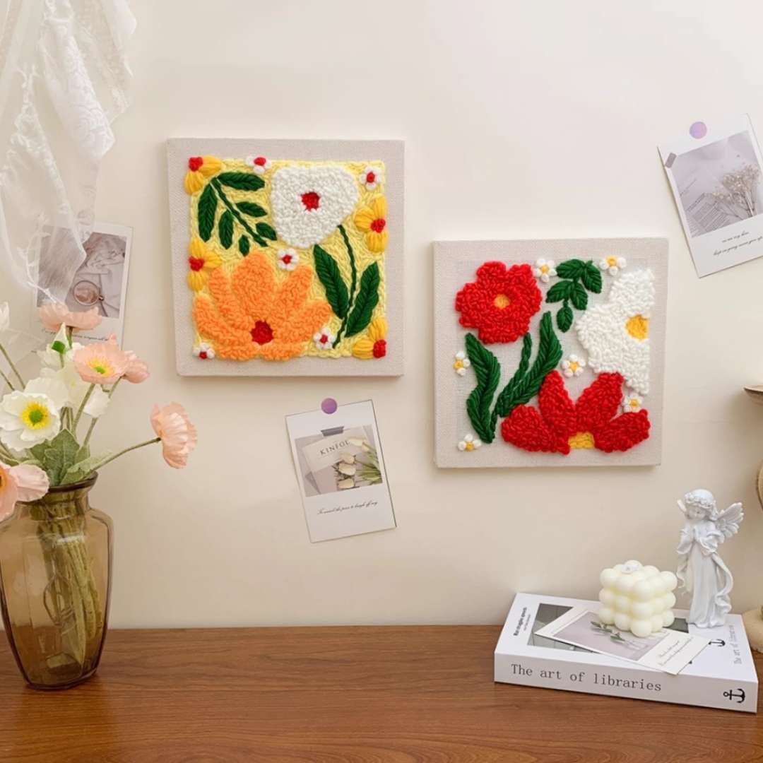 Display of Puddingcase Flower-Red and Flower-Yellow Punch Needle Kits, showcasing finished DIY embroidery designs